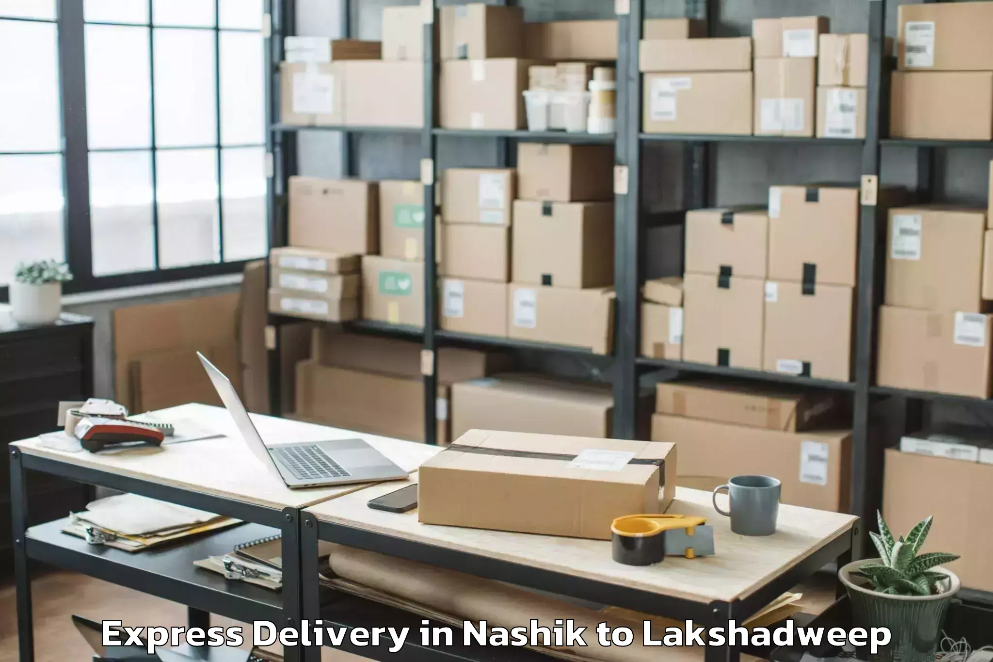 Professional Nashik to Andrott Express Delivery